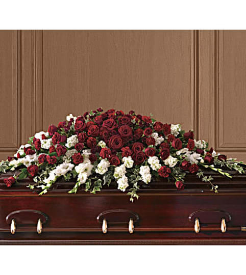 Garden Grandeur Casket Spray. An arrangement by Hillcrest Florist.
