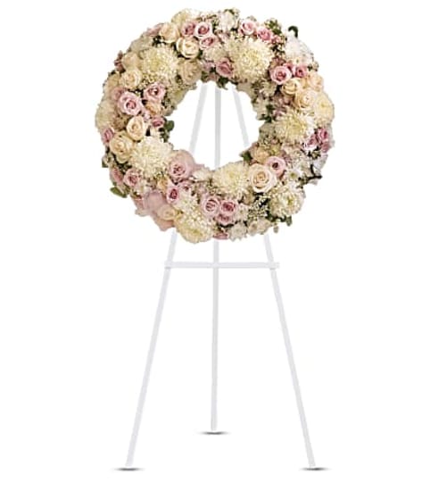 Peace Eternal Wreath. An arrangement by Hillcrest Florist.