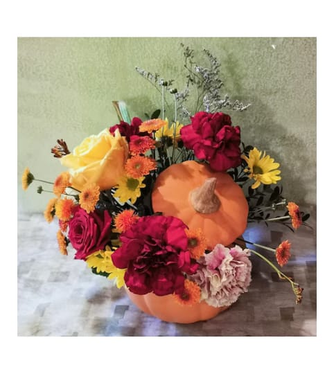 Sally's Pumpkin - Designer Choice. An arrangement by Triple A Florist.