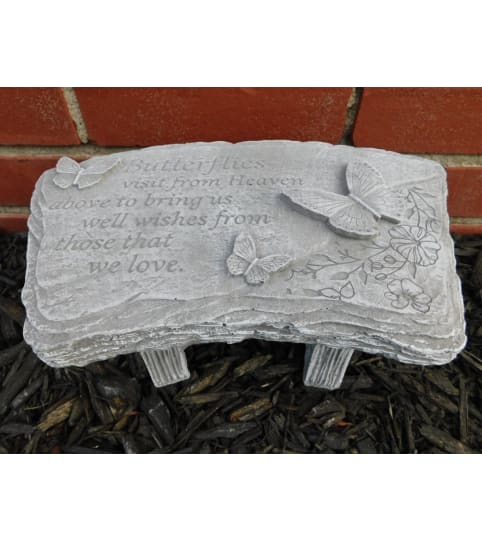 Butterflies Visit from Heaven Bench. An arrangement by North Liberty Flower Shop.