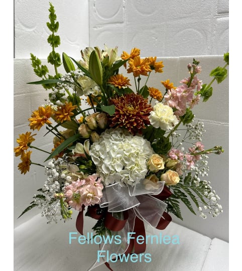 Fellows Harvest Sunset Elegance. An arrangement by Fellows Fernlea Flowers.