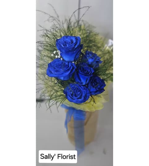 Sally's Deep Blue Bouquet. An arrangement by Triple A Florist.