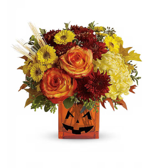 Teleflora's Halloween Glow. An arrangement by Triple A Florist.