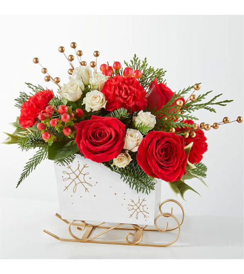 GONE SLEDDING. An arrangement by J.D. Ballantine's Flowers and Gifts.