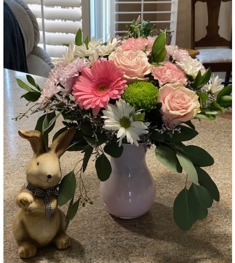 Beautiful Baby Girl Lamb Arrangement. An arrangement by Loyalist Flowers.