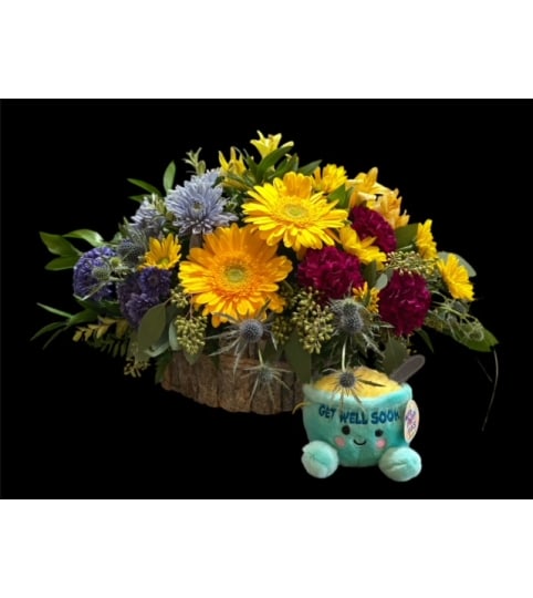 The Cutest Little Welly Ever. An arrangement by Loyalist Flowers.