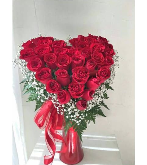 Heart of Roses. An arrangement by Flowers and Beyond.
