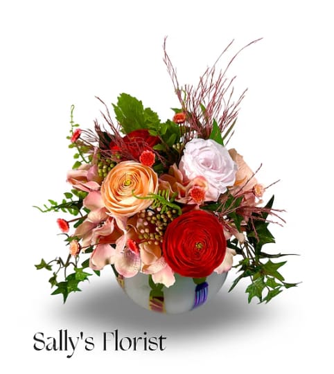 Sally's Preserved Lasting Birthday Joy. An arrangement by Triple A Florist.