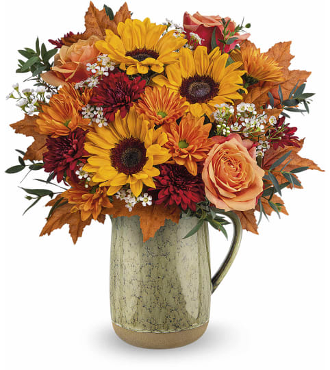 Harvest Season Bouquet by Teleflora. An arrangement by Sueppel's Flowers.