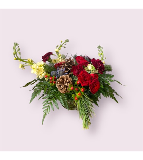 Pines N' Petals. An arrangement by Lilac and Honey Floral Design Studio.