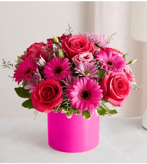 Flirty Fun. An arrangement by Susana's Flowers.