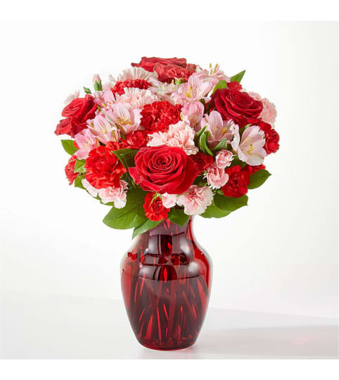 Candy Kisses Bouquet ™ FTD®. An arrangement by Grower Direct. Candy Kisses Bouquet ™ FTD®. An arrangement by Grower Direct.