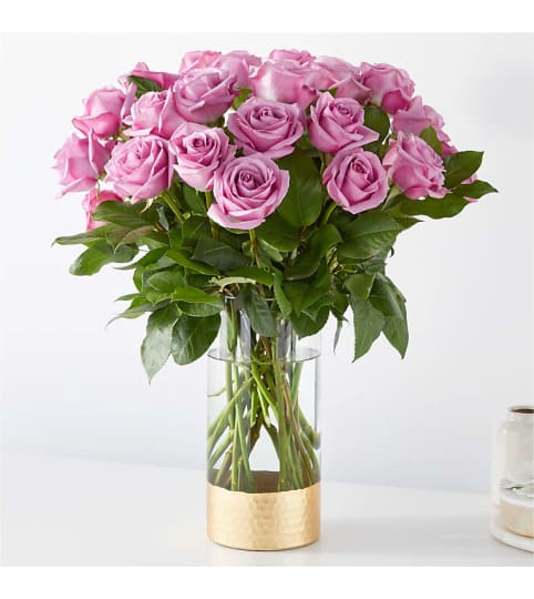 Secret Admirer Lavender Rose Bouquet. An arrangement by Conny's Flower Shop.