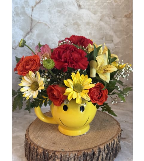 All Smiles. An arrangement by Kelly Ann's Floral.