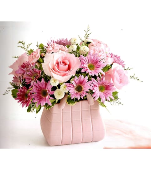 Pink Handbag Pink Bouquet. An arrangement by Julie's Artistic Rose.