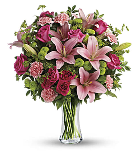 Dressed To Impress Bouquet. An arrangement by Conny's Flower Shop.