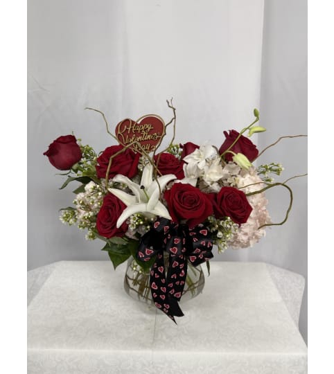 Red Hot Romance. An arrangement by Commerce Flowers.