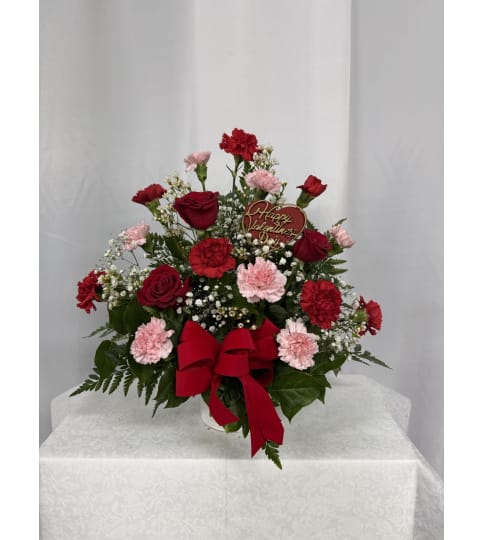 Valentine Infinite Devotion. An arrangement by Commerce Flowers.