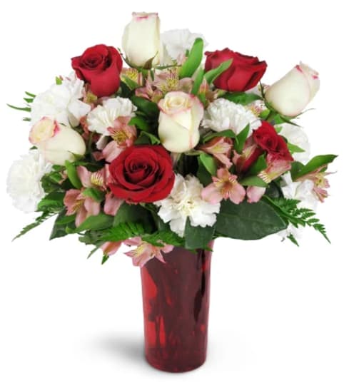 ROMANCE OF THE ROSES. An arrangement by J.D. Ballantine's Flowers and Gifts.