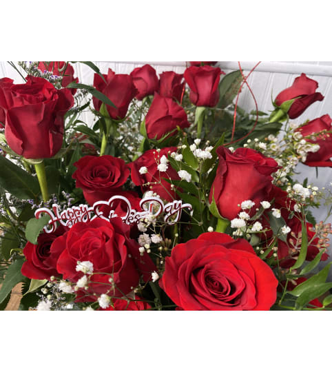 Romantic Ruby Embrace Red Roses. An arrangement by The Flower Box Florist.
