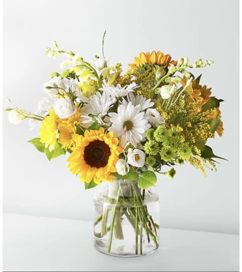 Good Morning Sunshine. An arrangement by The Flower Box Florist.