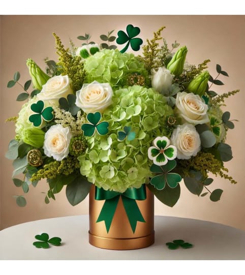 Pot O Gold. An arrangement by A Touch of Elegance Florist and Events LLC.