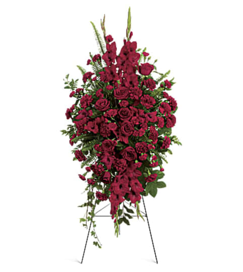 Deepin Our Hearts Spray. An arrangement by Hillcrest Florist.