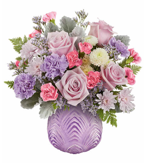 Teleflora's Dreamy Blooms Bouquet. An arrangement by Sueppel's Flowers.