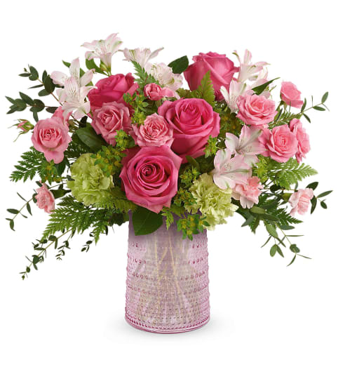 Teleflora's Sparkling Joy Bouquet. An arrangement by Sueppel's Flowers.