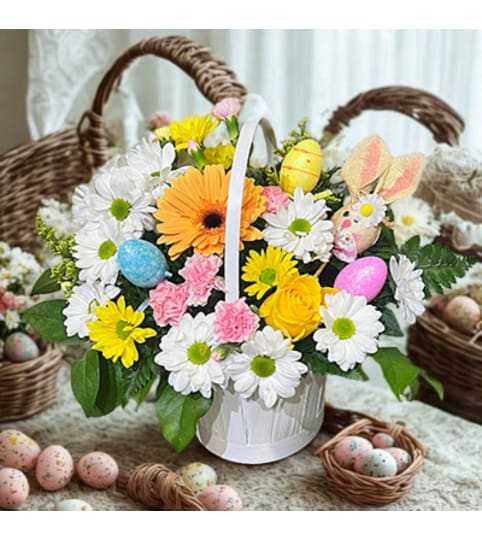 Flower Basket Arrangement. An arrangement by Flowers by Girlfriends.