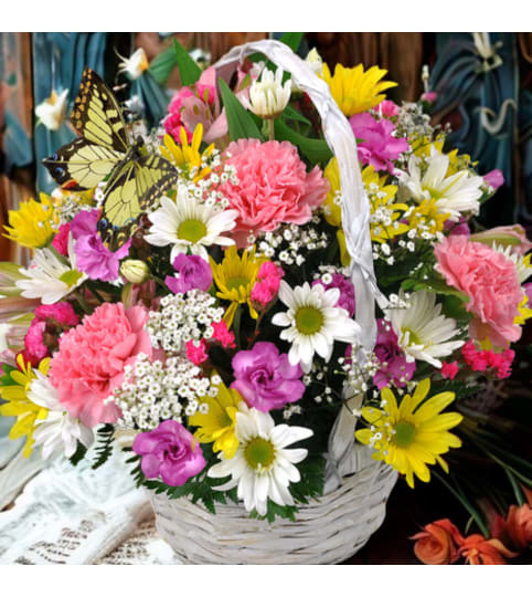 Basket Arrangement. An arrangement by Flowers by Girlfriends.