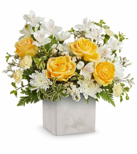 Teleflora's Contemporary Blossoms. An arrangement by Sueppel's Flowers.