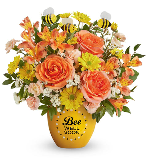 Teleflora's Buzzworthy Blooms. An arrangement by Sueppel's Flowers.