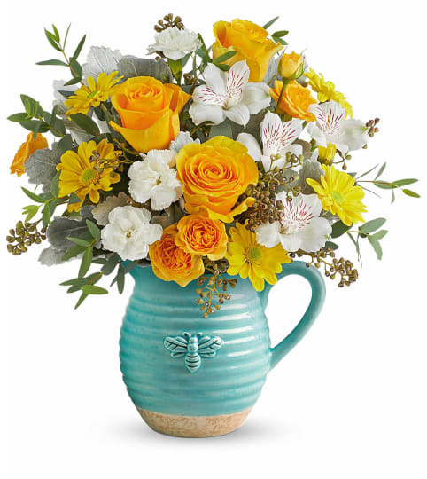 Teleflora's Bee Joyful Bouquet. An arrangement by Sueppel's Flowers.