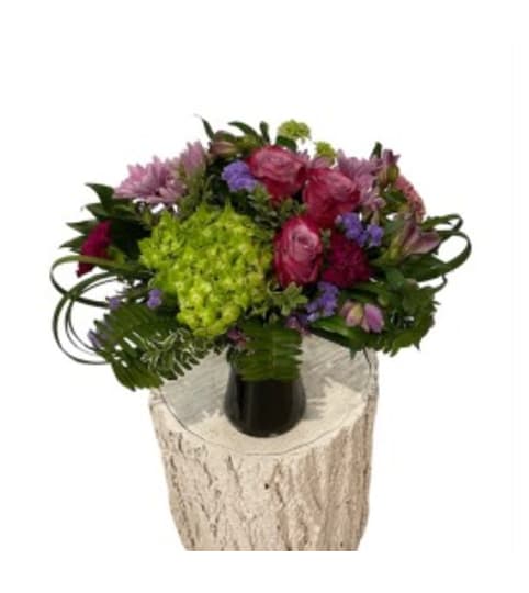 You're Plum Perfect. An arrangement by Loyalist Flowers.