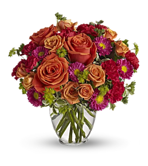 Sunset Bloom Delight. An arrangement by Flore's Shop.