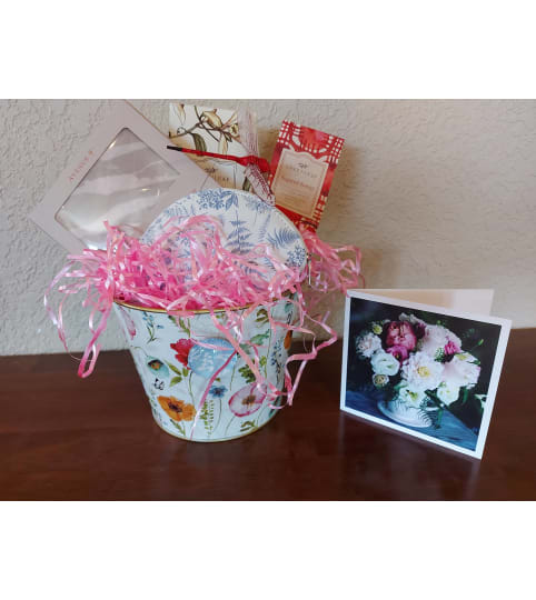 Pamper Her Gift Basket. An arrangement by Loyalist Flowers.