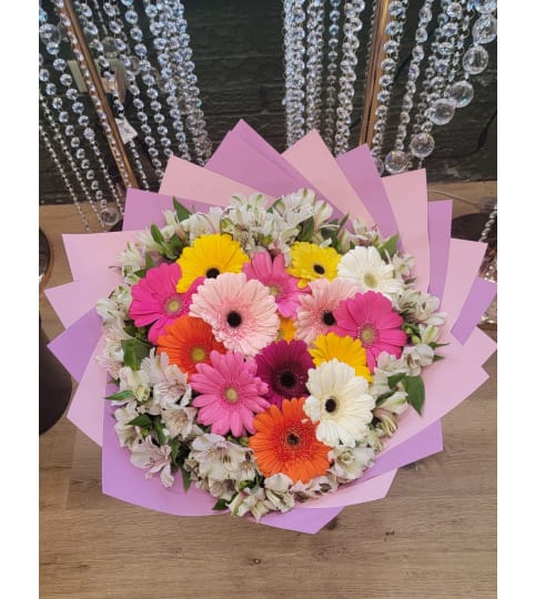 Rainbow Delight Bouquet. An arrangement by Vemongi Flowers.