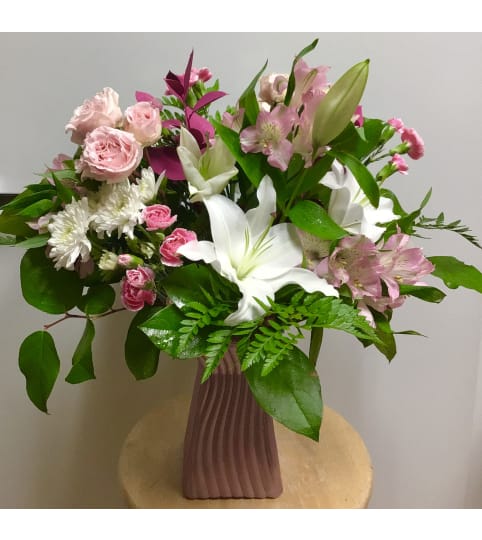 Pink Skirt. An arrangement by Roma Flowers and Gifts.