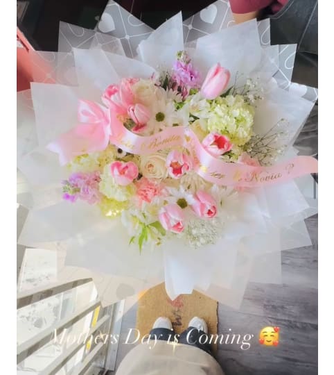 Mamas Mix Bouquet. An arrangement by Geni's Florist and Gifts.