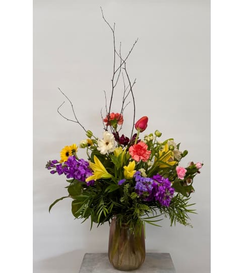 Simply the Best. An arrangement by Blooming Boutique Florist.