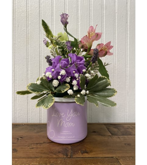 Scentimental Yankee Candle For Mom. An arrangement by The Flower Box Florist.