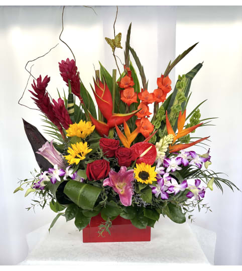 Tropical Sunset Garden. An arrangement by Commerce Flowers.
