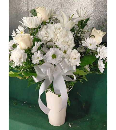 Whispering White Blooms. An arrangement by Howard Beach Florist.