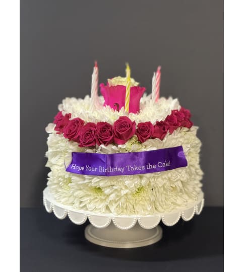 BLOOMING BIRTHDAY CAKE. An arrangement by Bill's Flowers Arrangements.