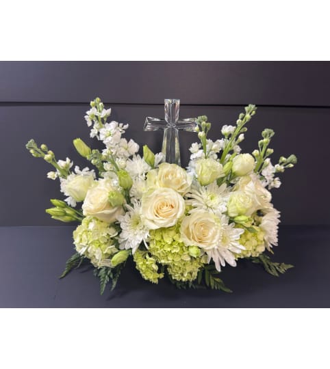 Crystal cross tribute. An arrangement by Bill's Flowers Arrangements.