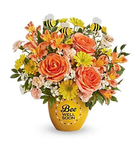 Teleflora's Buzzworthy Blooms Bouquet. An arrangement by Believe Flowers.