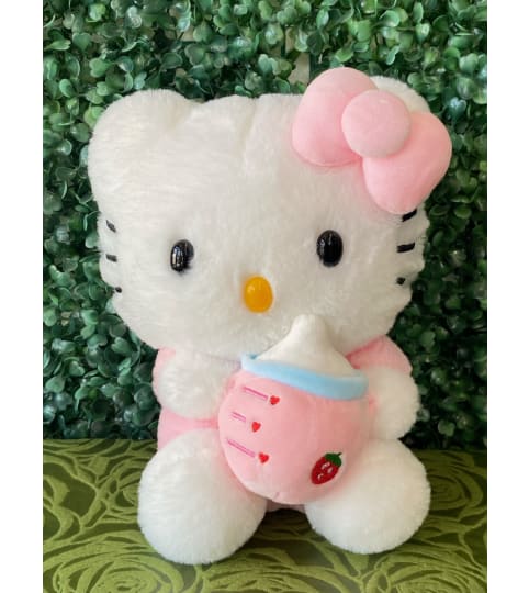 Cat Plush with Strawberry Milk Bottle. An arrangement by Flower World and Gifts.