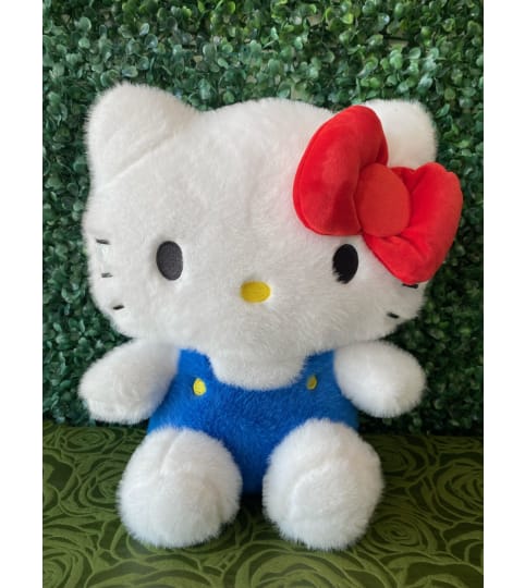 Cat Plush in Blue Overalls with Classic Red Bow. An arrangement by Flower World and Gifts.