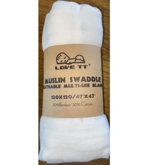 Muslin Swadling Blankets (set of 3). An arrangement by The Flower Box Florist.